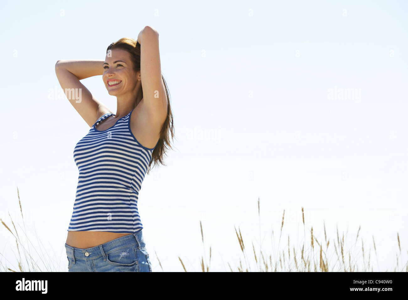Crossed Arms Behind The Head High Resolution Stock Photography and