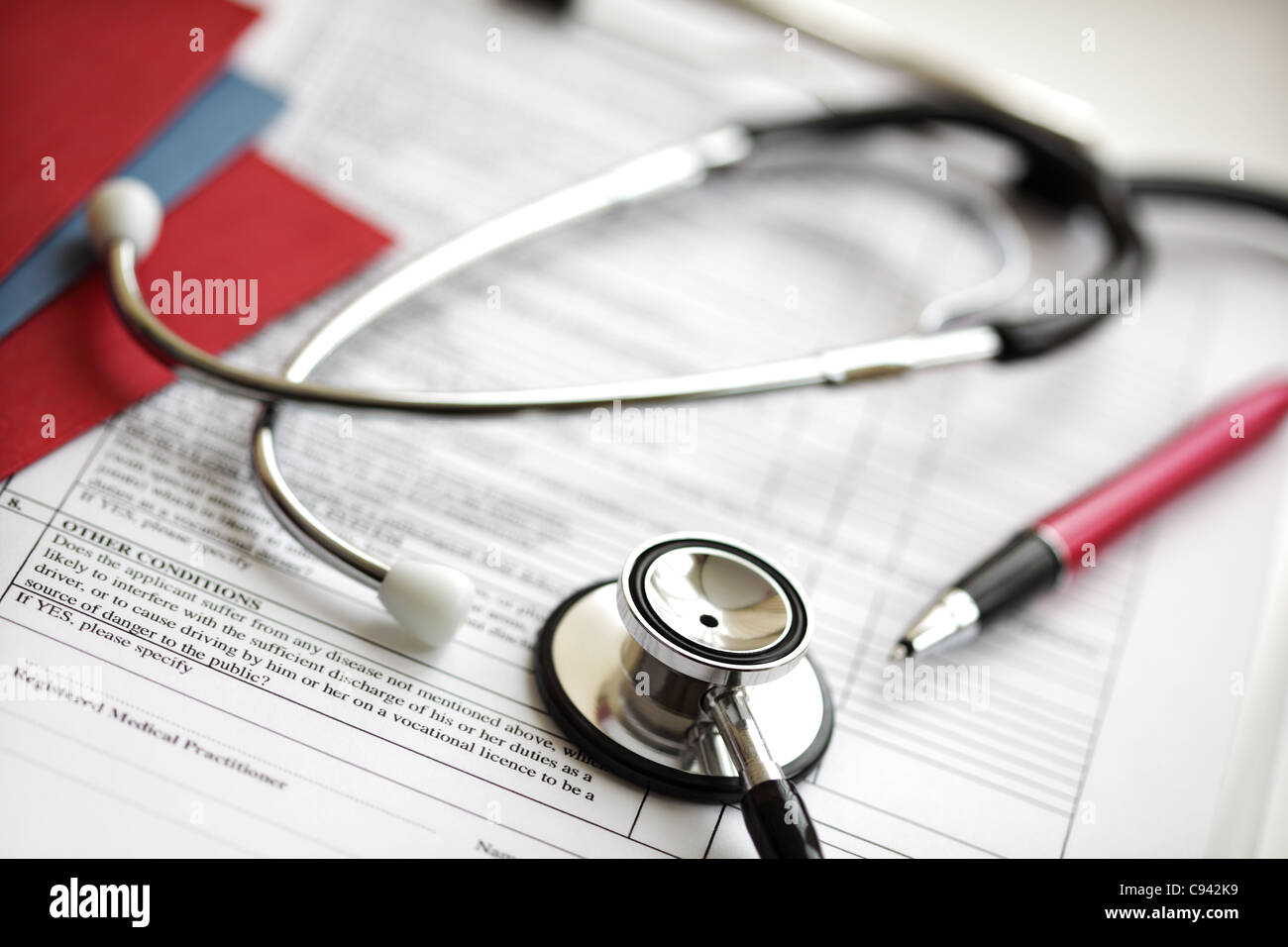 Medical records and stethoscope Stock Photo