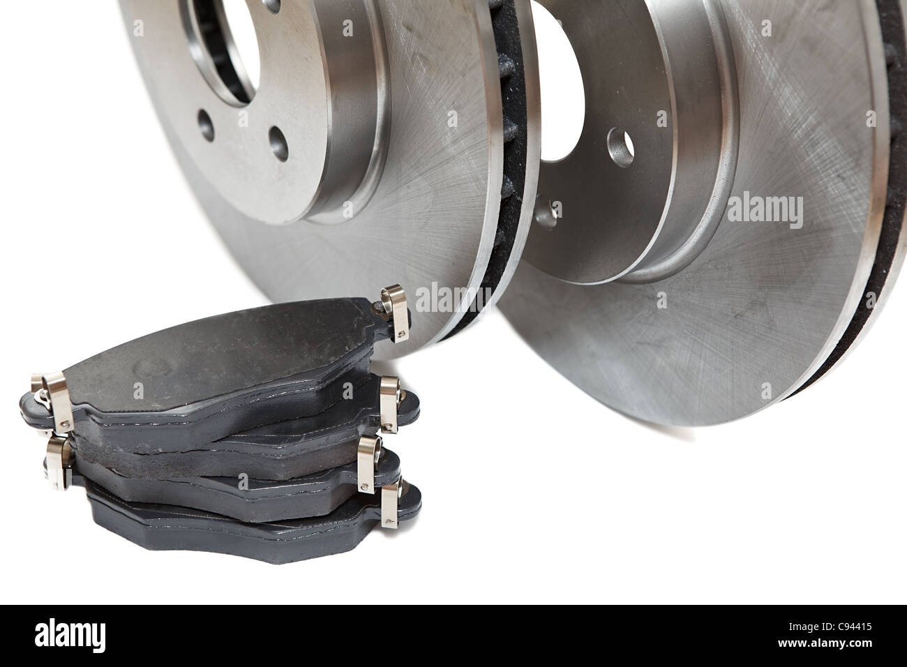 New brake discs and pads isolated on white background Stock Photo Alamy