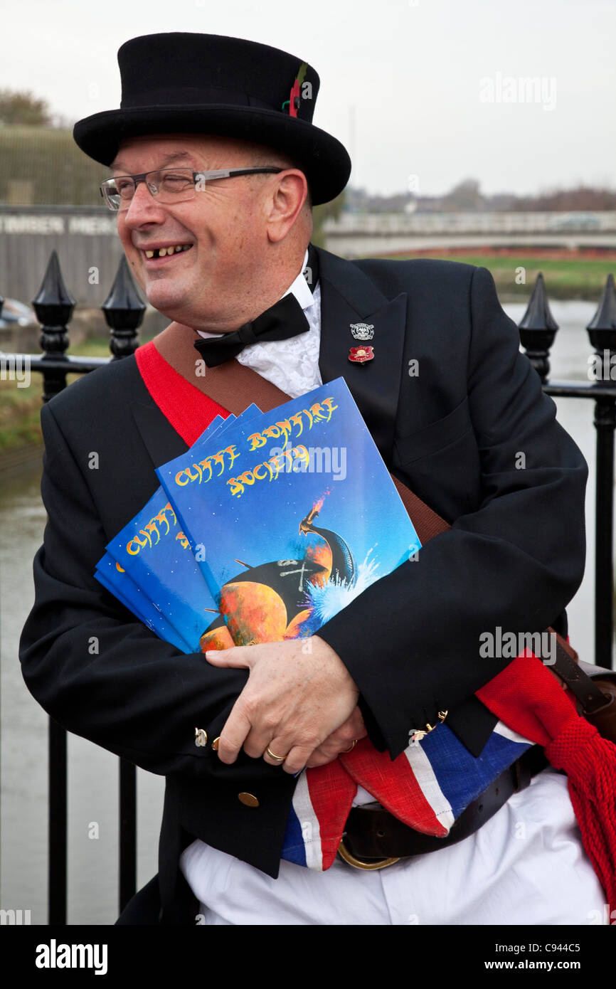 Man selling bonfire society programmes on November 5th, Lewes, Sussex, England Stock Photo