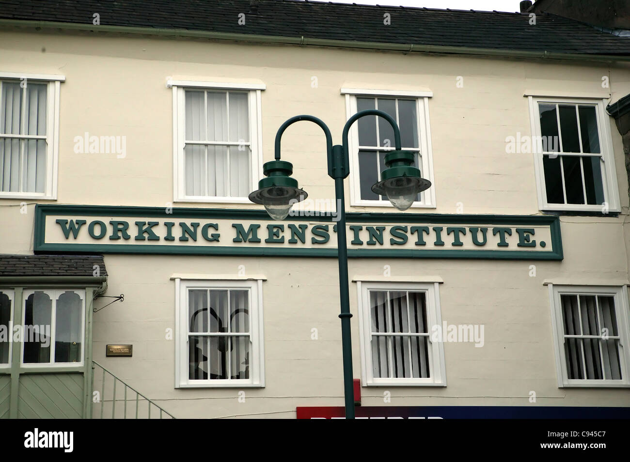 Working, Mens, Institute, Building Frontage, Working Mens Club, Cream and green, Green Lettering, Historical Building Stock Photo
