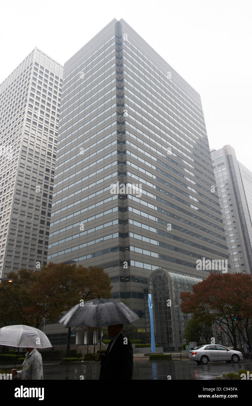 November 11 11 Tokyo Japan Against The Backdrop Of Olympus Billboard Pedestrians Scurry By In The Cold Mid Autumn Rain In Tokyos Shinjuku On Friday November 11 11 As Is The Weather
