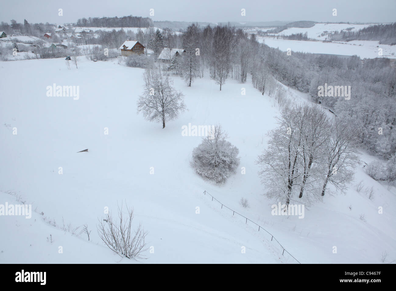 Russian winter. Snow covered outskirts of the Izborsk Fortress in Pskov region, Russia. Stock Photo