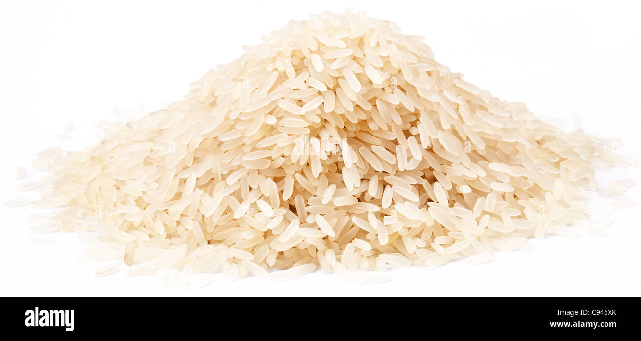 Rice heap isolated on a white background. Stock Photo