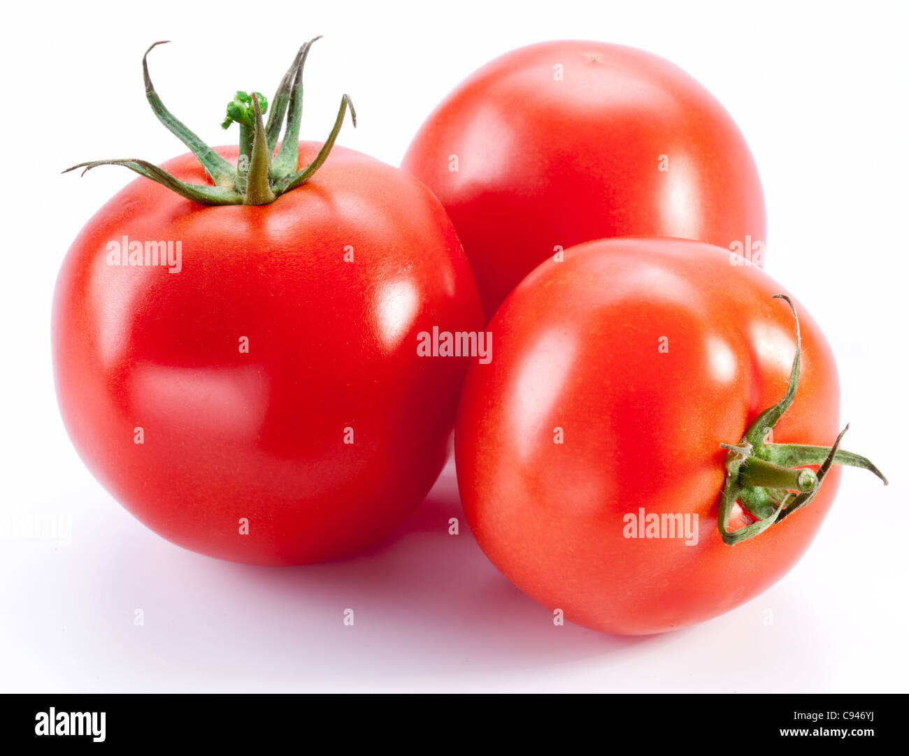 Ripe tomatoes isolated on a white background Stock Photo - Alamy