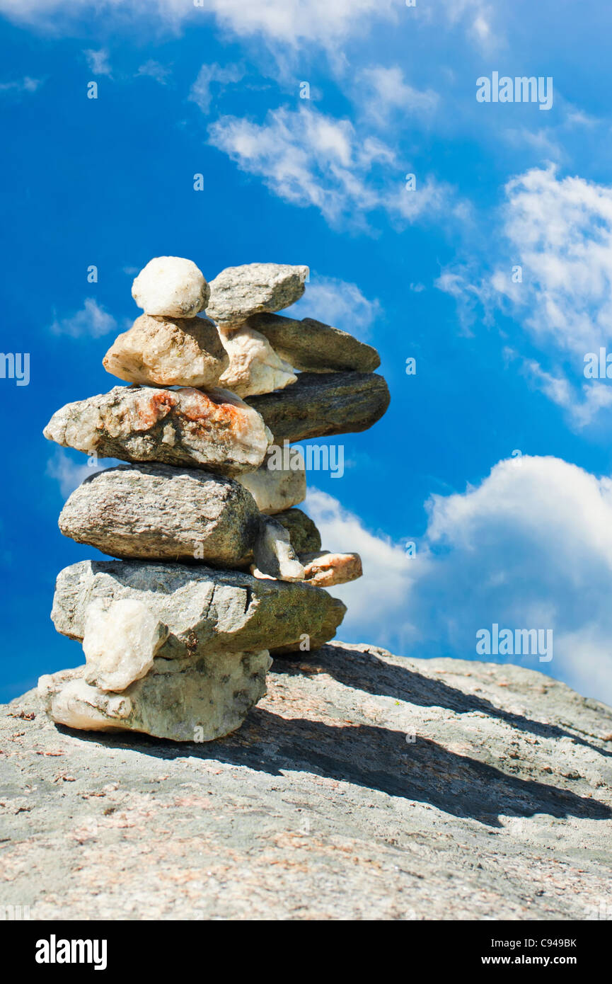 Two stone towers. Stack of meditation zen stones over blue sky Stock Photo