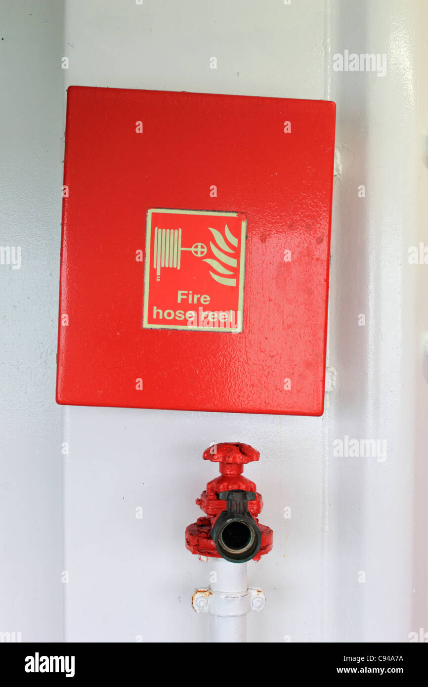 Fire hose reel on Dover to Calais P&O ferry crossing the English Channel Stock Photo