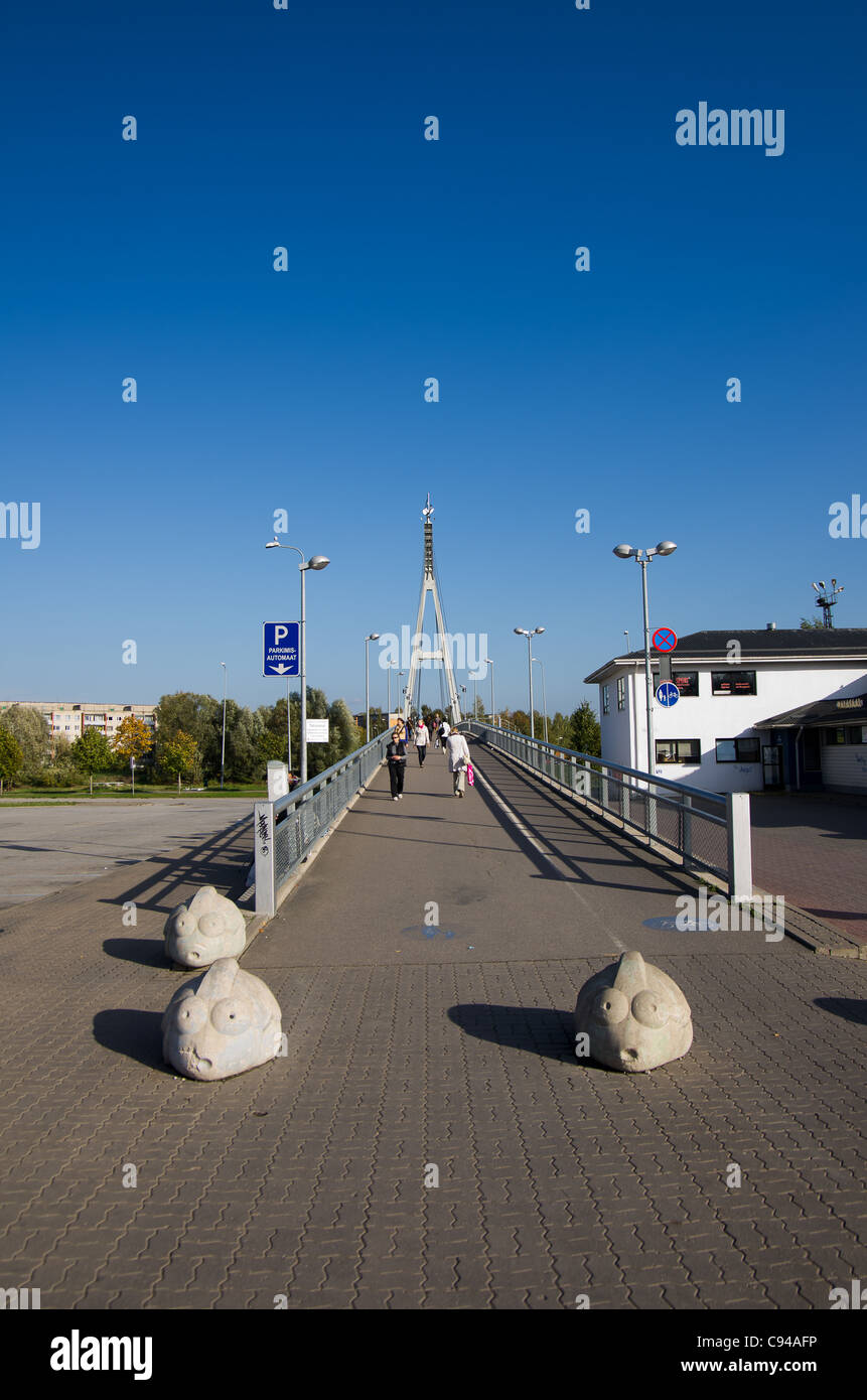 Road to bridge. Cable-stayed bridge in the city Tartu, Estonia. Stock Photo