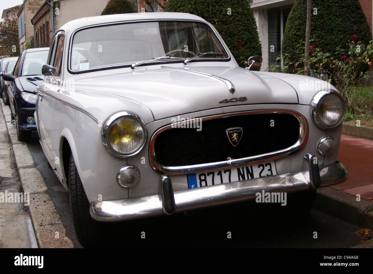 Peugeot model 403 car, type driven by TV detective Columbo, parked on a street in Toulouse, Haute-Garonne, France Stock Photo