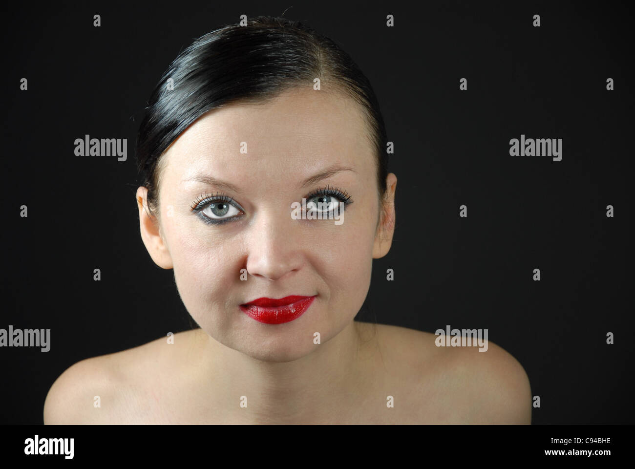 portrait of a girl on a black background Stock Photo - Alamy
