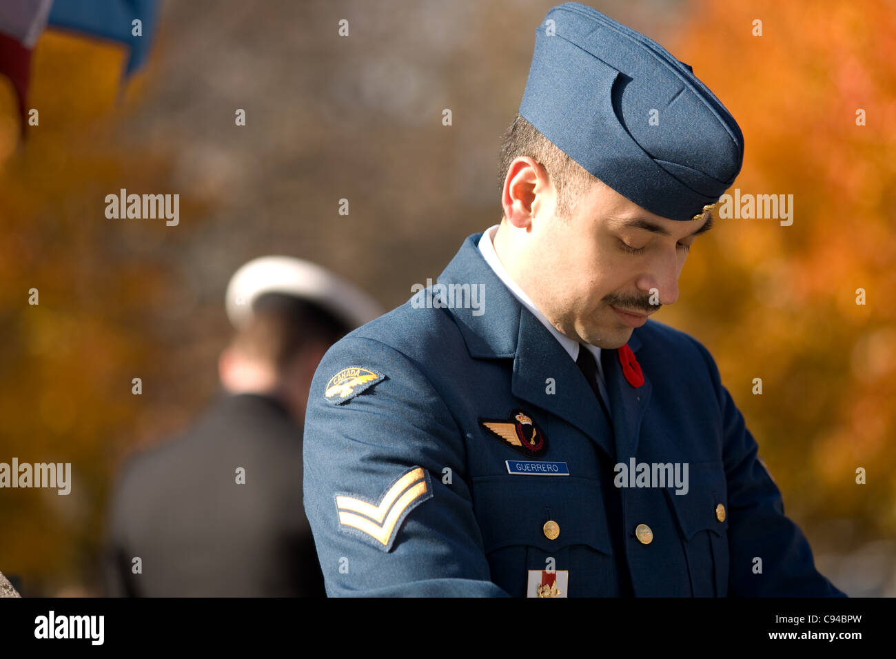 London Ontario, Canada - November 11, 2011. A Canadian airman and sailor stand posts during Remembrance Day ceremonies at the Cenotaph in Victoria Park in London Ontario Canada. Stock Photo