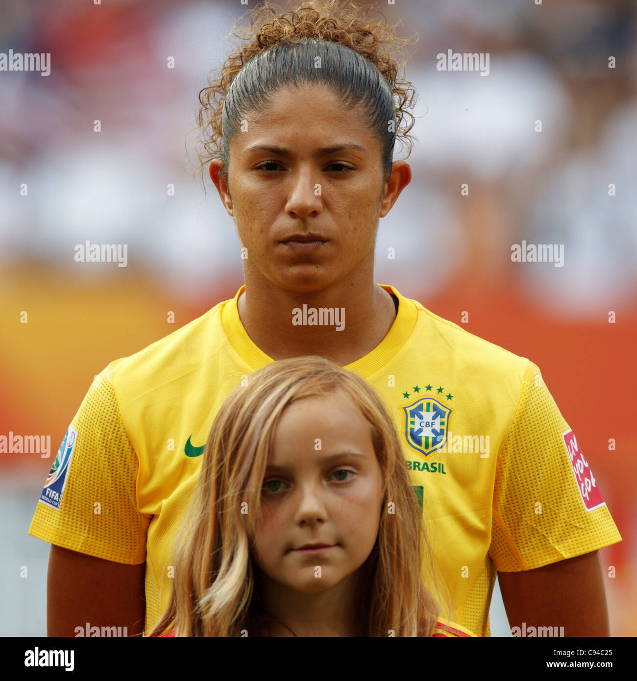Cristiane of Brazil stands for team introductions before a FIFA Women's World Cup quarterfinal soccer match against the USA. Stock Photo