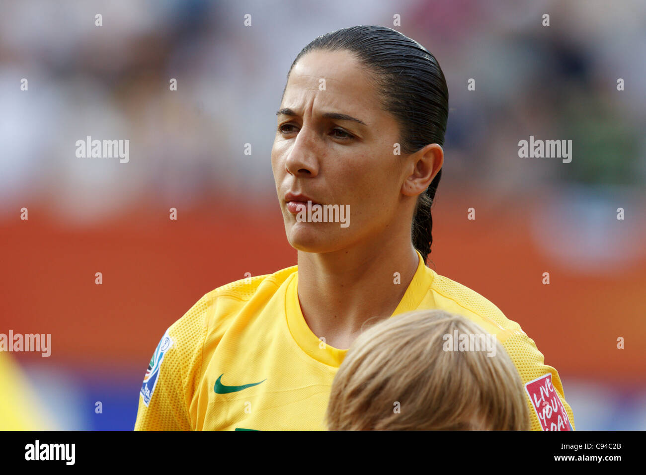 Daiane of Brazil stands for team introductions before a 2011 FIFA Women