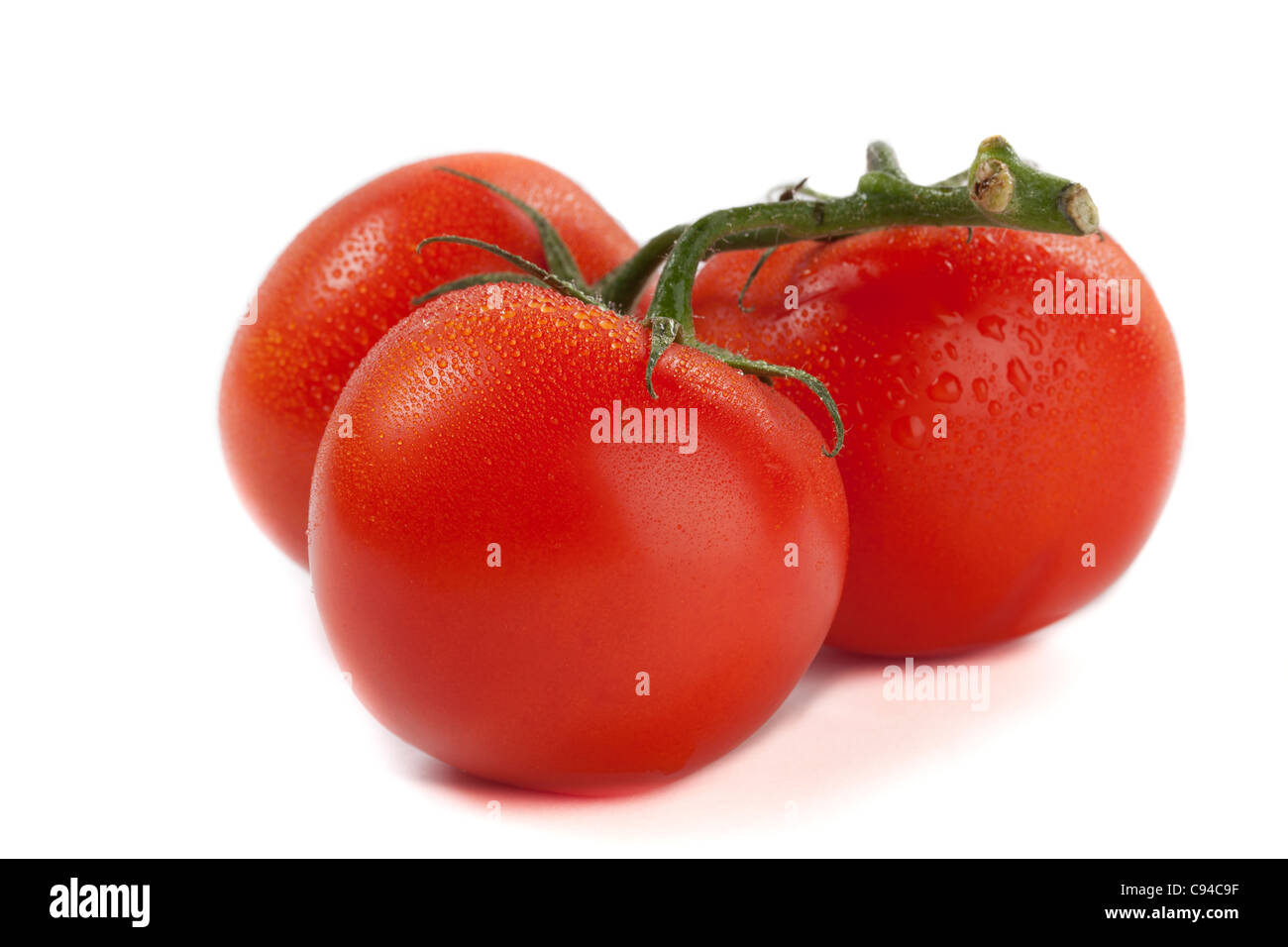 Three Fresh Red Tomatoes Isolated on White Background Stock Photo - Alamy