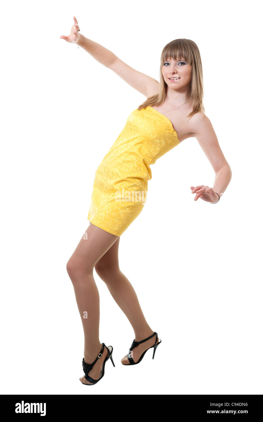 Girl in yellow dress isolated on white background Stock Photo - Alamy