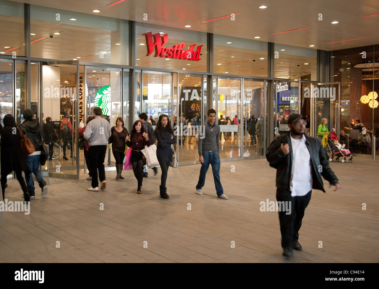 Shoppers at entrance to Westfield shopping centre, Stratford, London UK Stock Photo