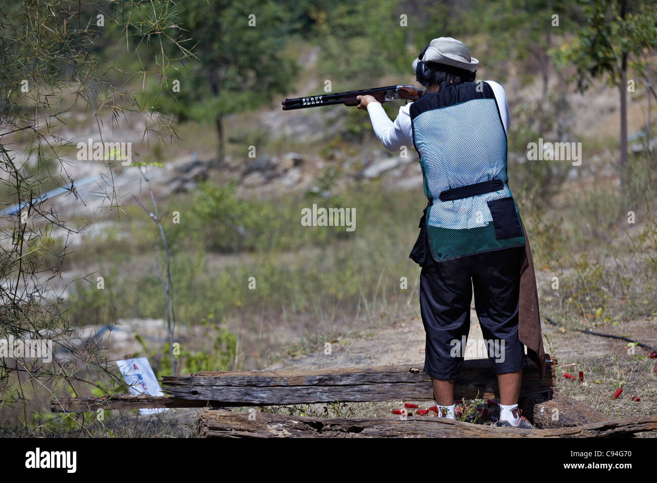 Clay pigeon shooting. Man using a