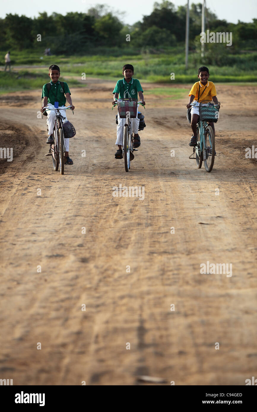 Indian school boys with bicycle Tamil Nadu India Stock Photo