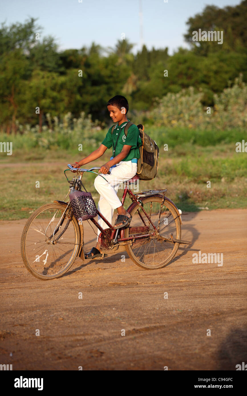 Indian school boy on bicycle Tamil Nadu India Stock Photo