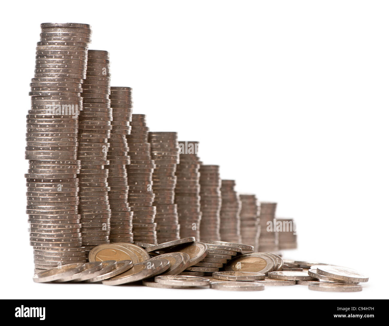 Stacks of 2 Euros Coins in front of white background Stock Photo