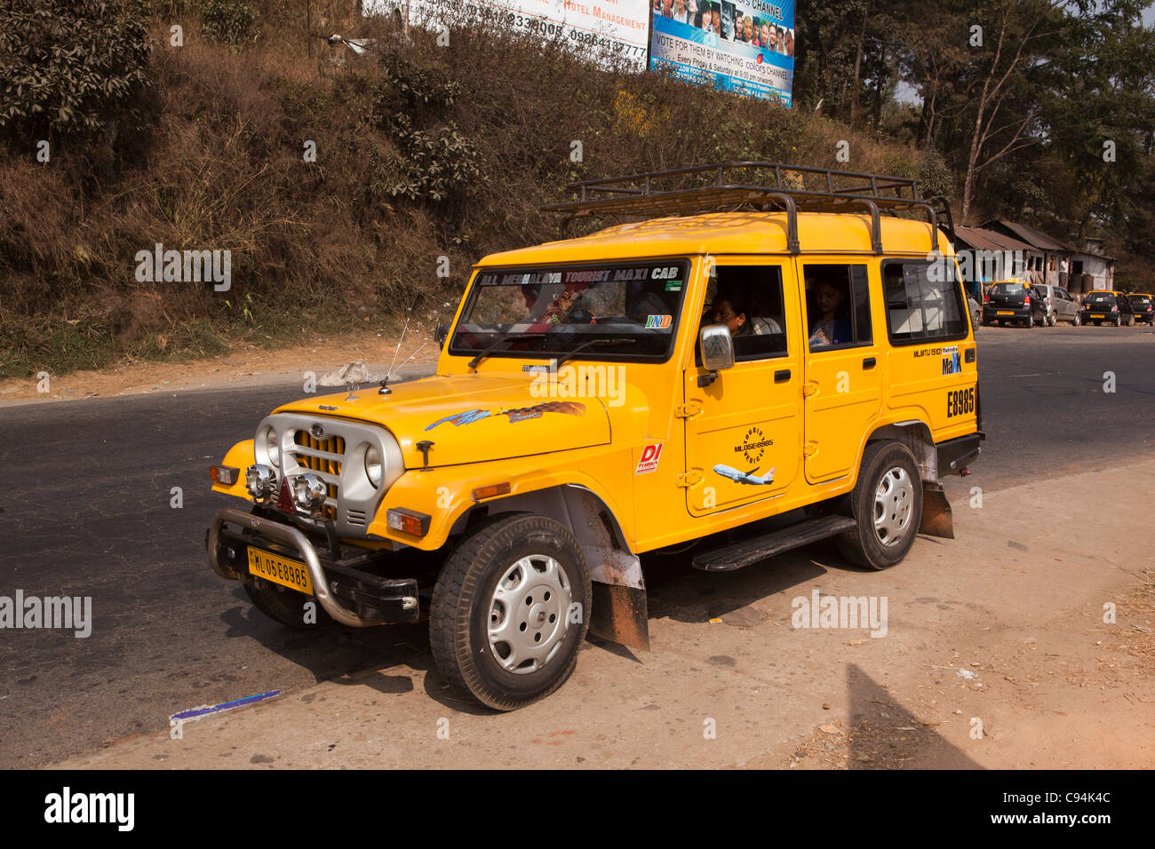 India, Meghalaya, Shillong, local transport, yellow Mahindra jeep used as collective taxi Stock Photo