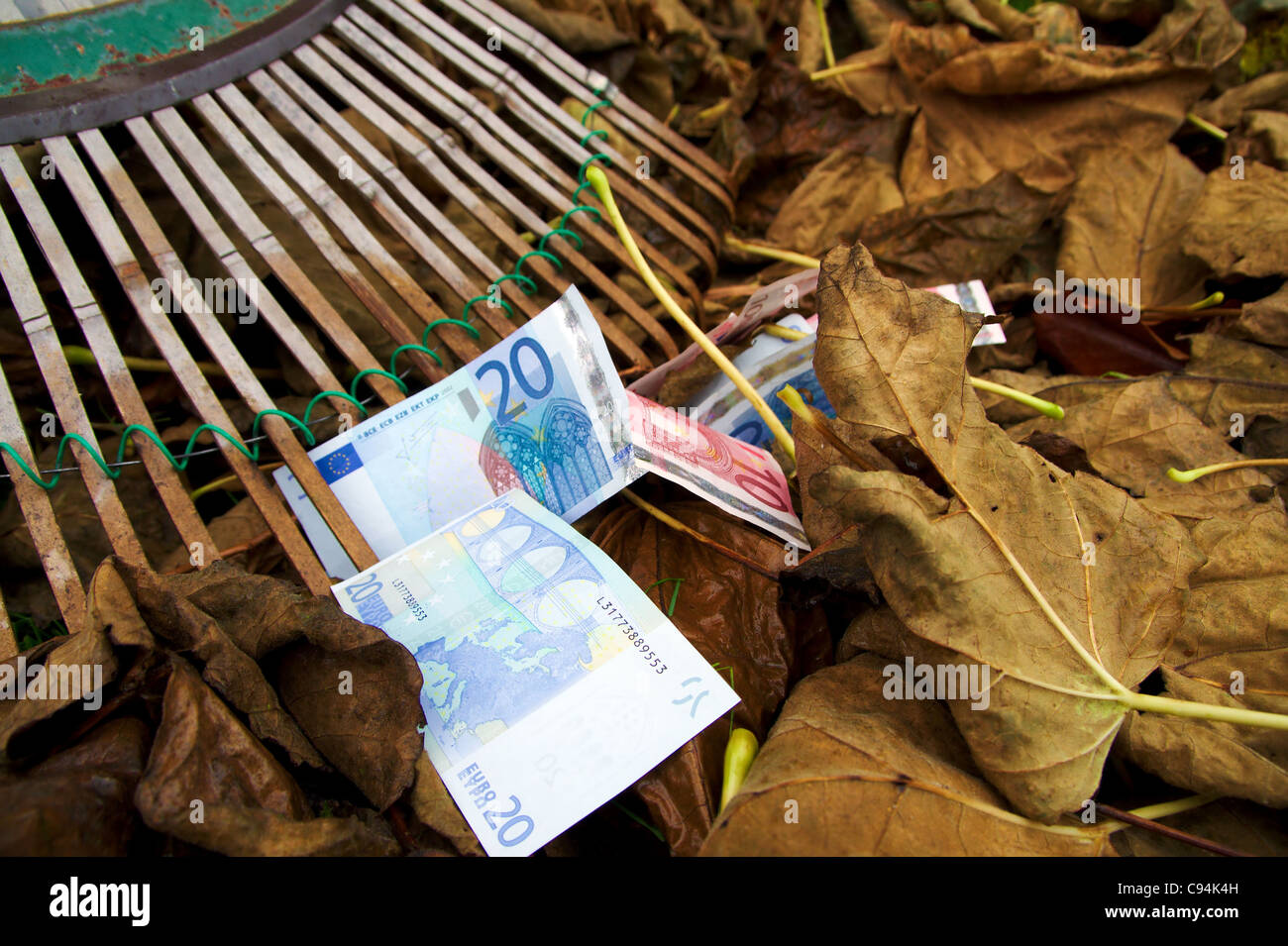 Raking money hires stock photography and images Alamy