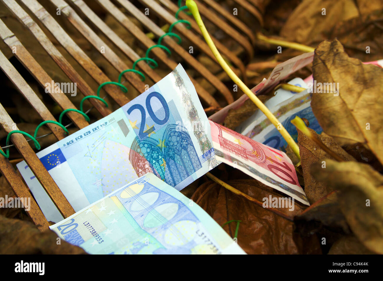 Raking money hi-res stock photography and images - Alamy