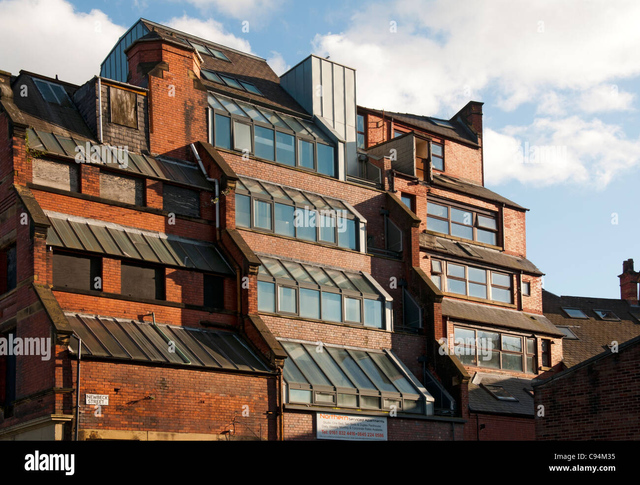 Stovells Buildings. Shudehill, Manchester, England, UK. Former workshops, the stepped design allowed in more light. Stock Photo