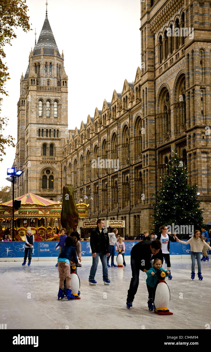 People ice skating by the Natural History Museum London England Great