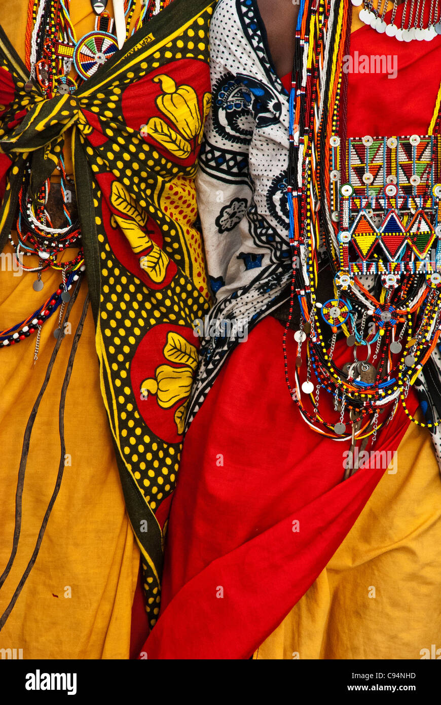 Close up of traditional Masai women's clothing and necklaces, Village in the Masai Mara, Kenya, Africa Stock Photo