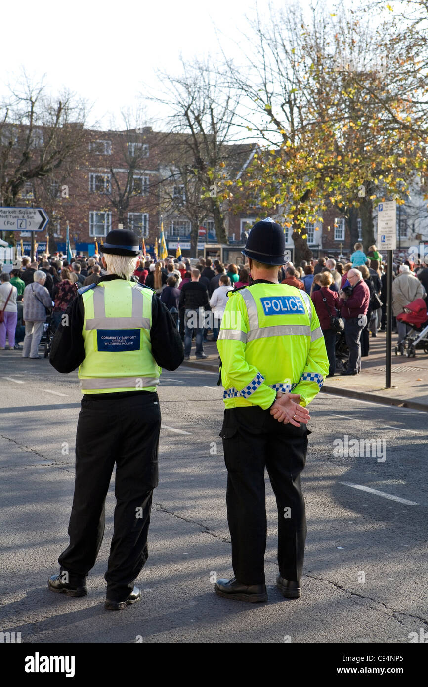Police officer and community support officer on duty at an event in Salisbury Wiltshire UK Stock Photo