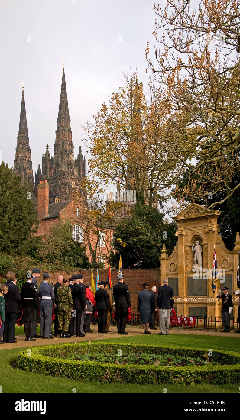 Waiting to lay wreaths of poppies in Lichfield Memorial Gardens on Remembrance Sunday 2011 Stock Photo