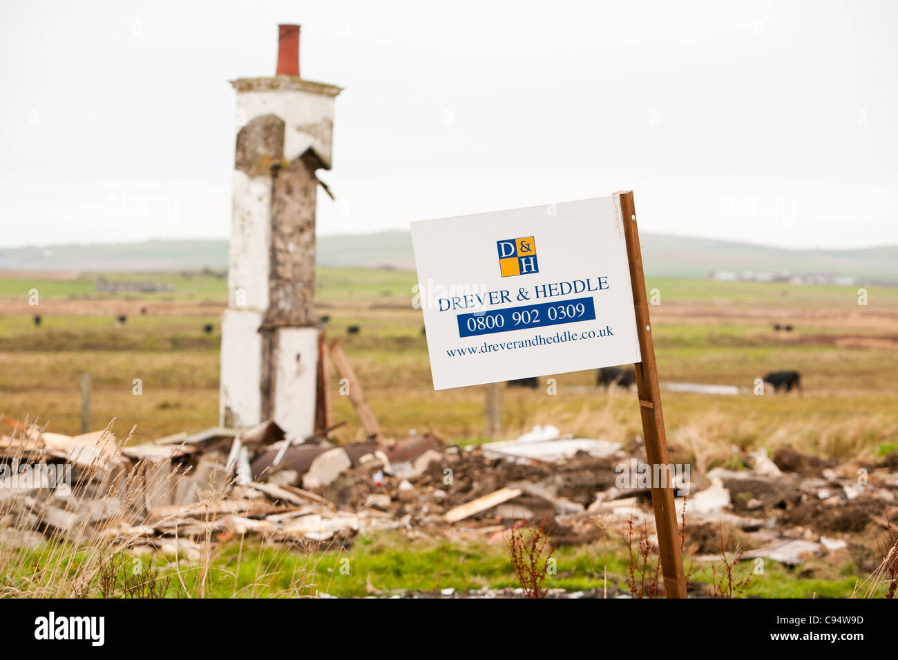 A for sale sign next to a totally collapsed house on mainland Orkney