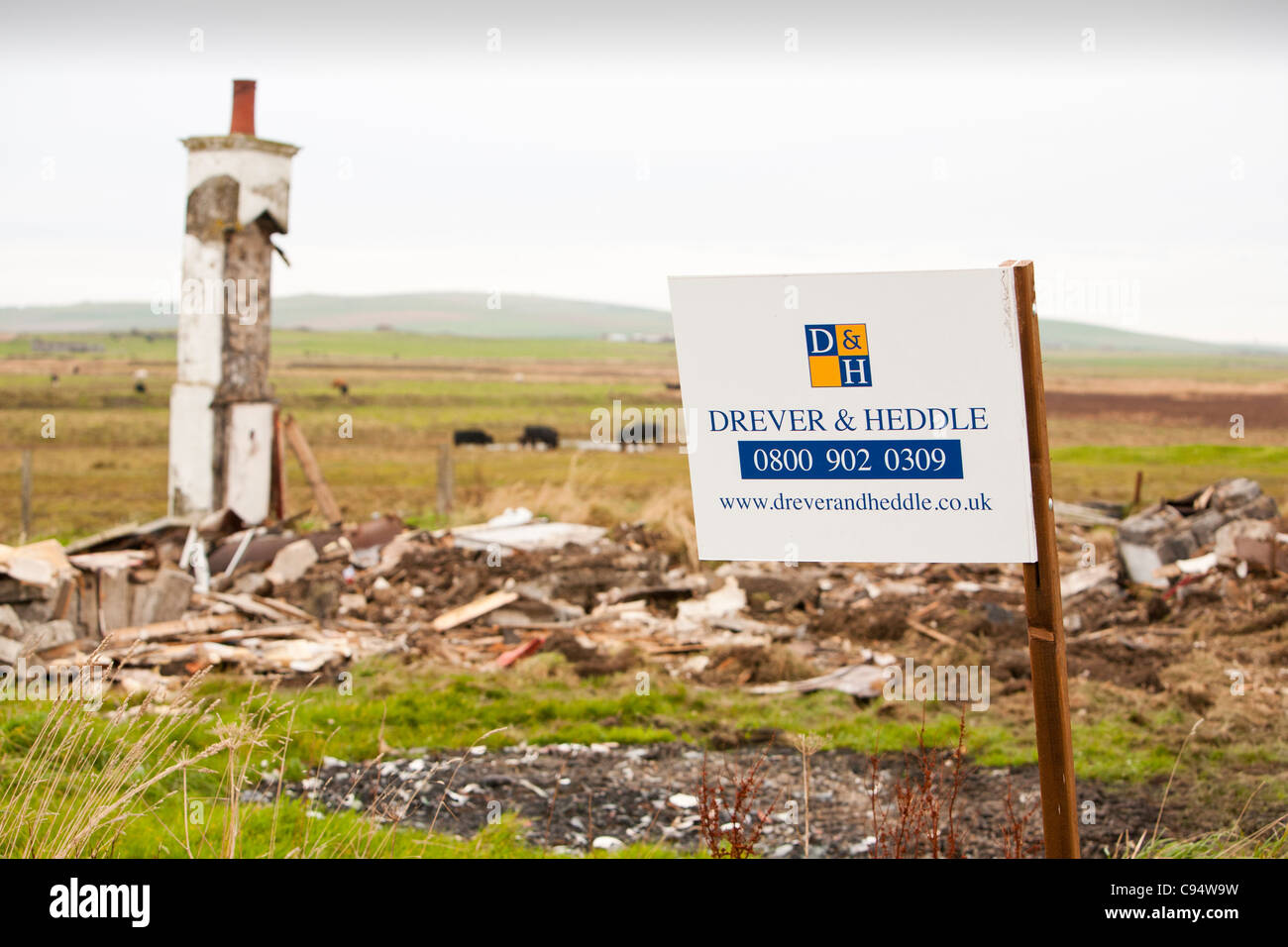 A for sale sign next to a totally collapsed house on mainland Orkney