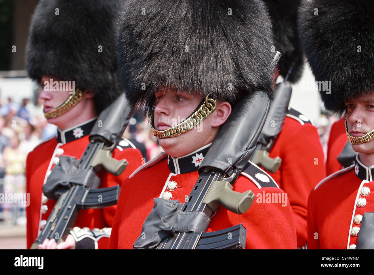 Foot guards with machine guns on parade outside Buckingham Palace, London, United Kingdom. Stock Photo