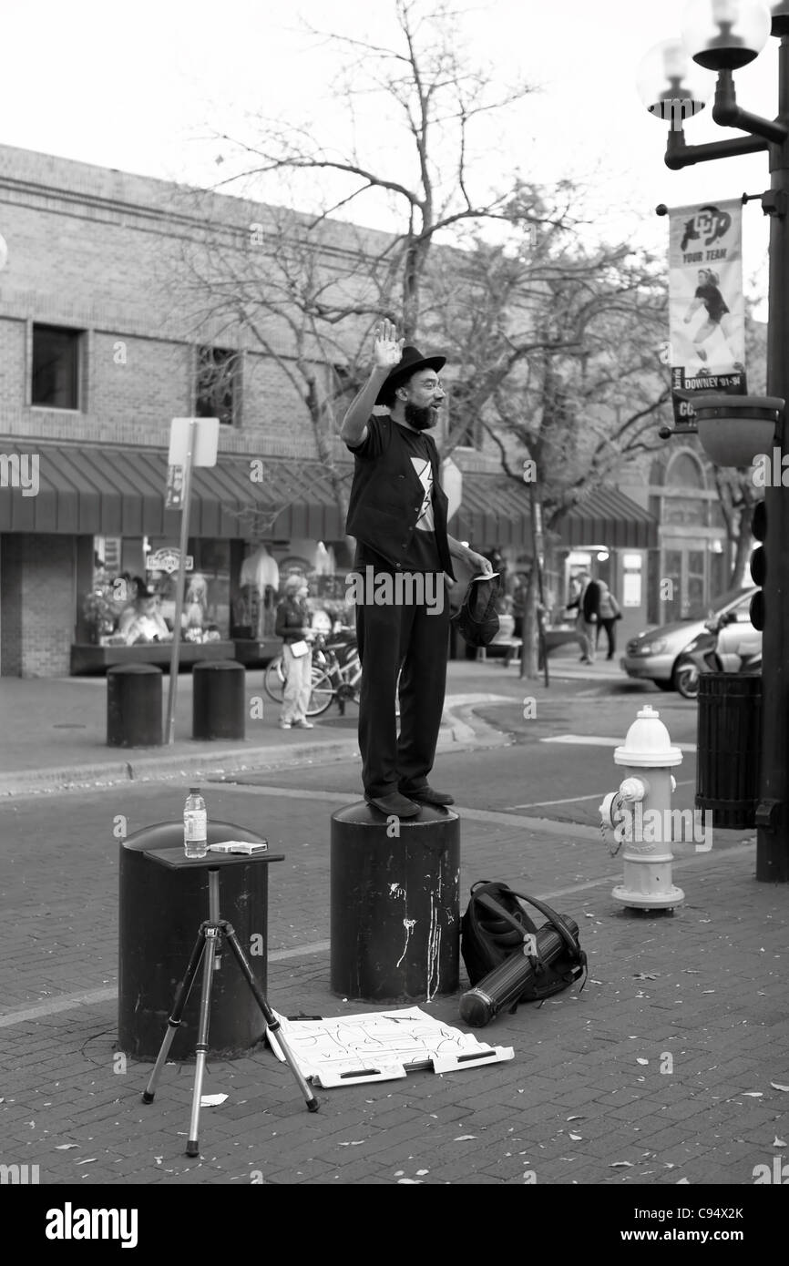 Busker and World Traveler Kenneth Lightfoot performs on the Pearl Street Mall in Boulder, Colorado Stock Photo