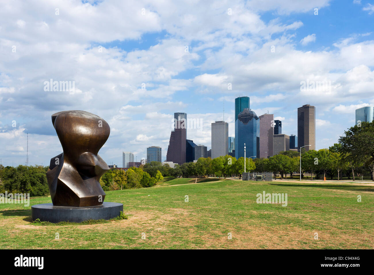 The city skyline with the Large Spindle Piece sculpture by Henry Moore in the foreground, Allen Parkway, Houston, Texas, USA Stock Photo