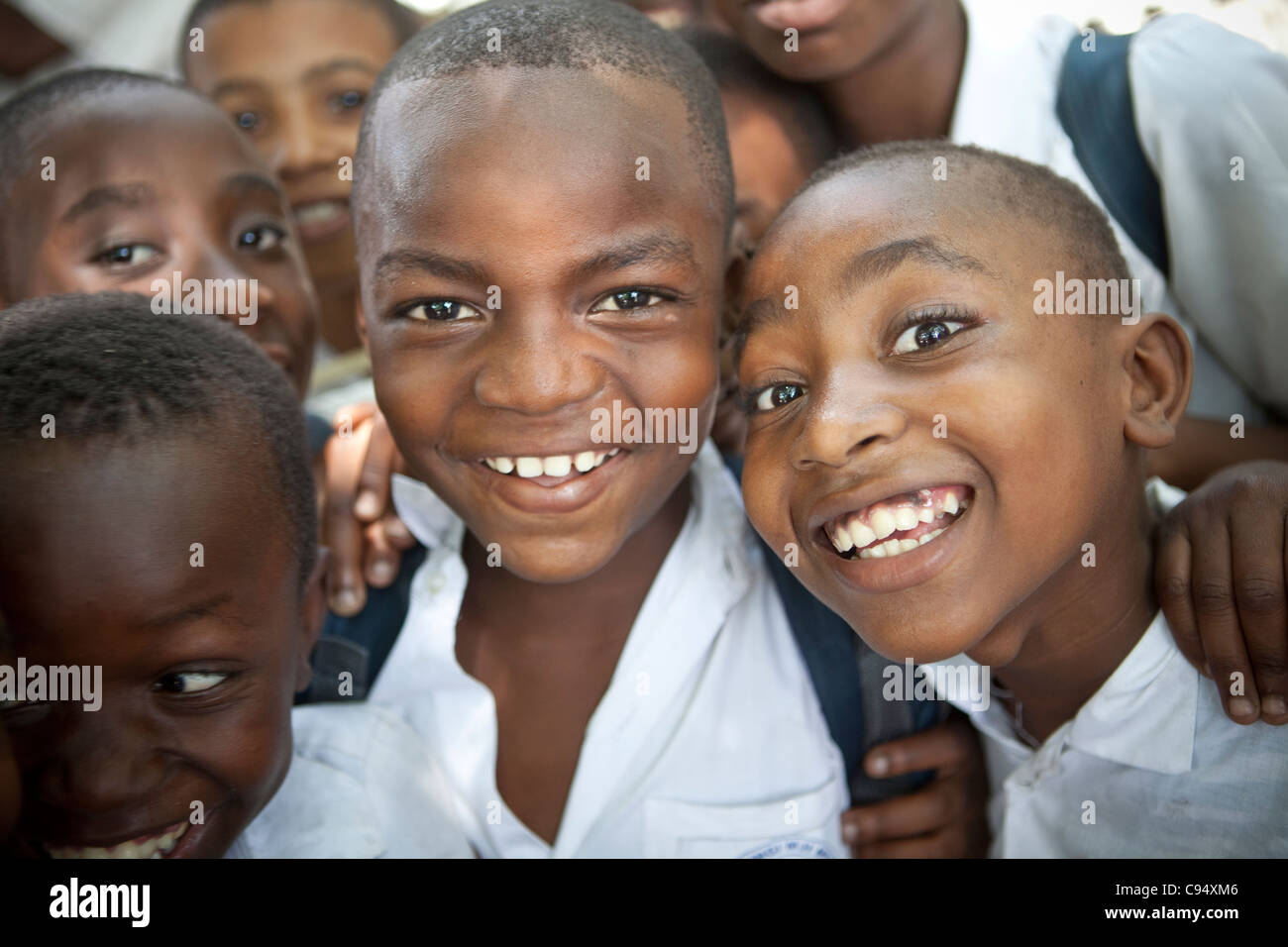 Students pose together in the courtyard of Mjimpya Primary School in Dar es Salaam, Tanzania. Stock Photo
