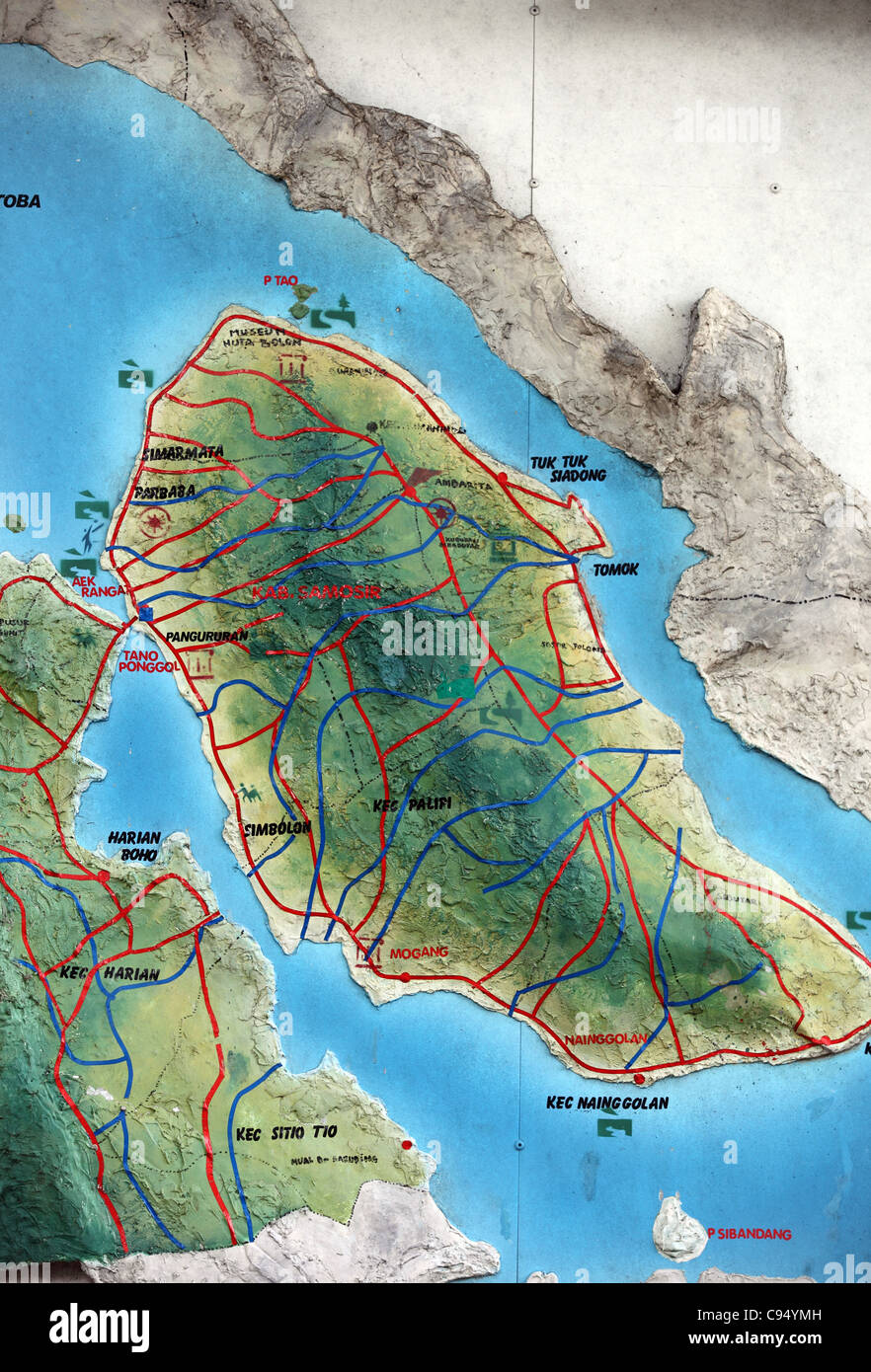 Basic map of Lake Toba and Samosir Island painted on an exterior wall. Stock Photo