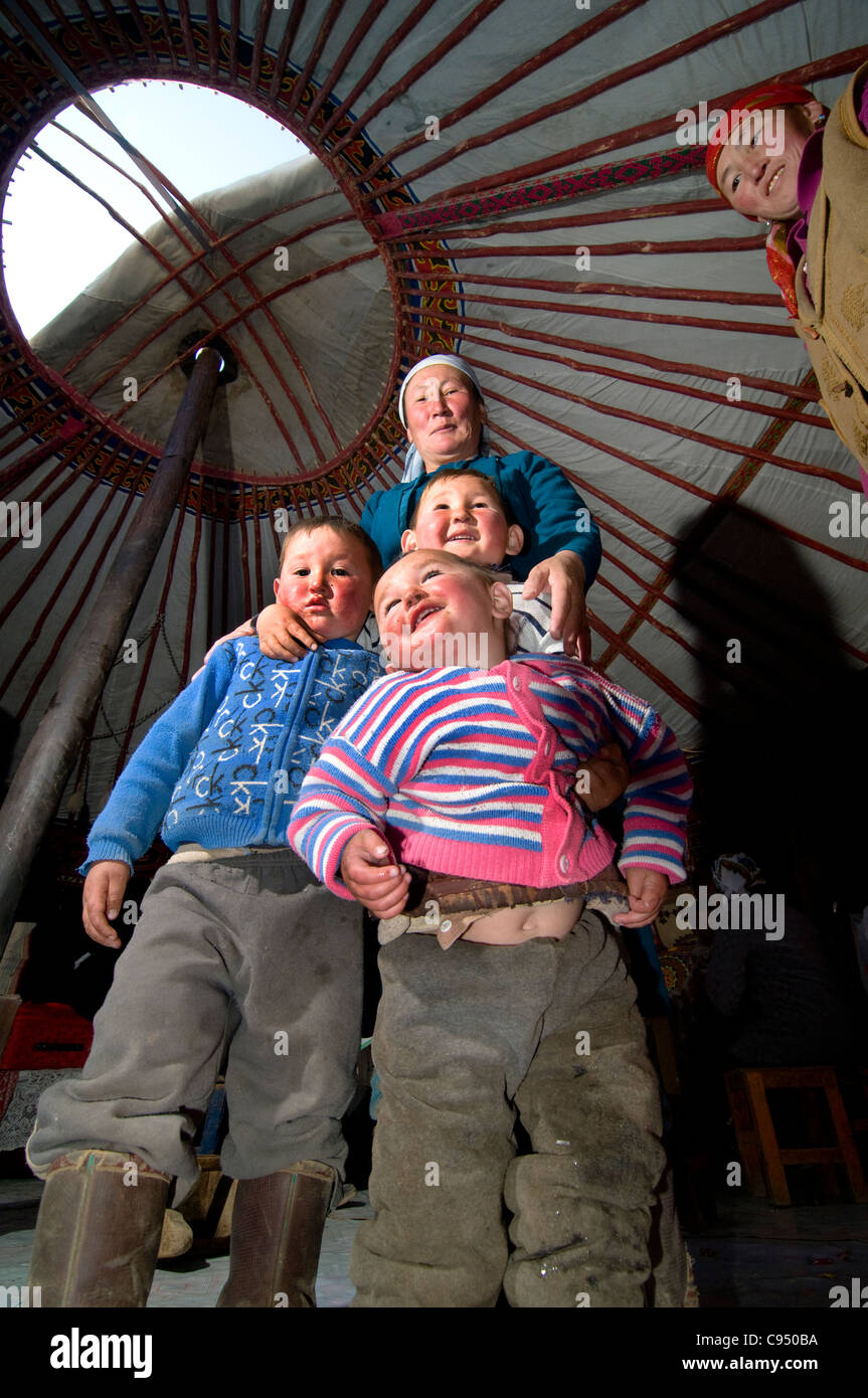 A Kazakh family in  their yurt. Stock Photo
