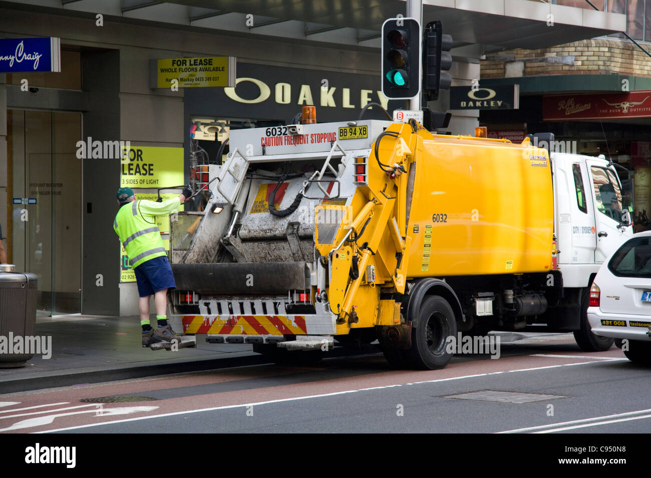 city of sydney waste rubbish vehicle collecting from the bins on
