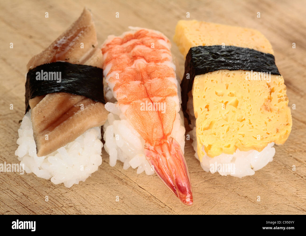 Closeup of Japanese eel, shrimp and egg nigiri zushi Stock Photo Alamy