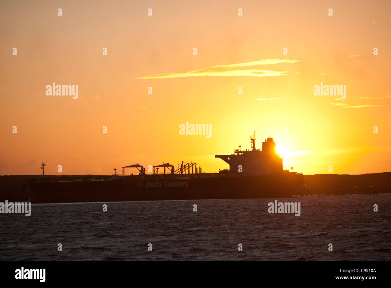 A Greek oil tanker docked at the Flotta oil terminal on the Idsland of flotta in the Orkney's Scotland, UK. Stock Photo