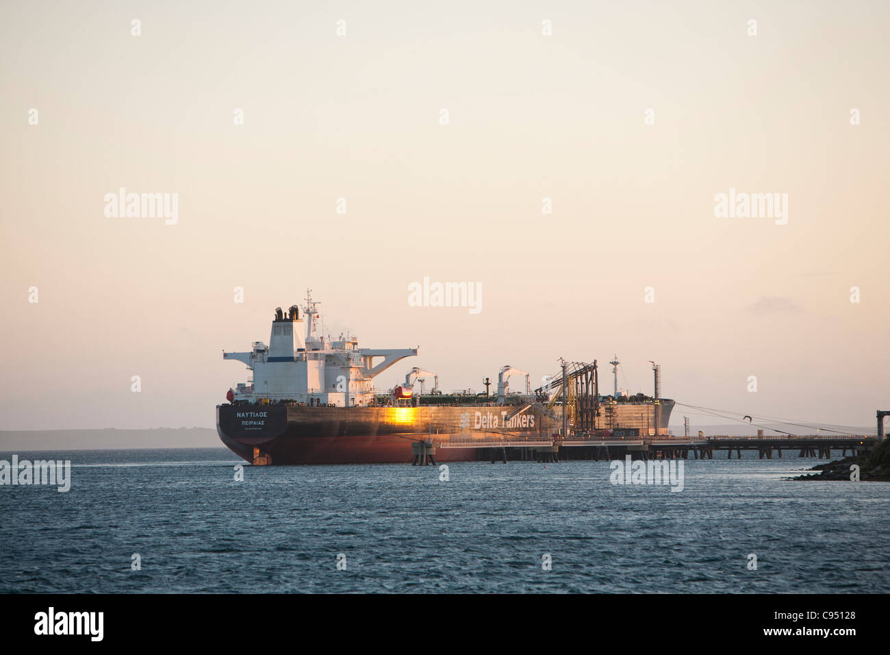 A Greek oil tanker docked at the Flotta oil terminal on the Idsland of flotta in the Orkney's Scotland, UK. Stock Photo