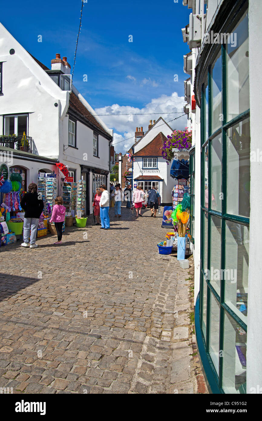 The cobbled Quay Street of Lymington with its souvenir shops and restaurants. Stock Photo