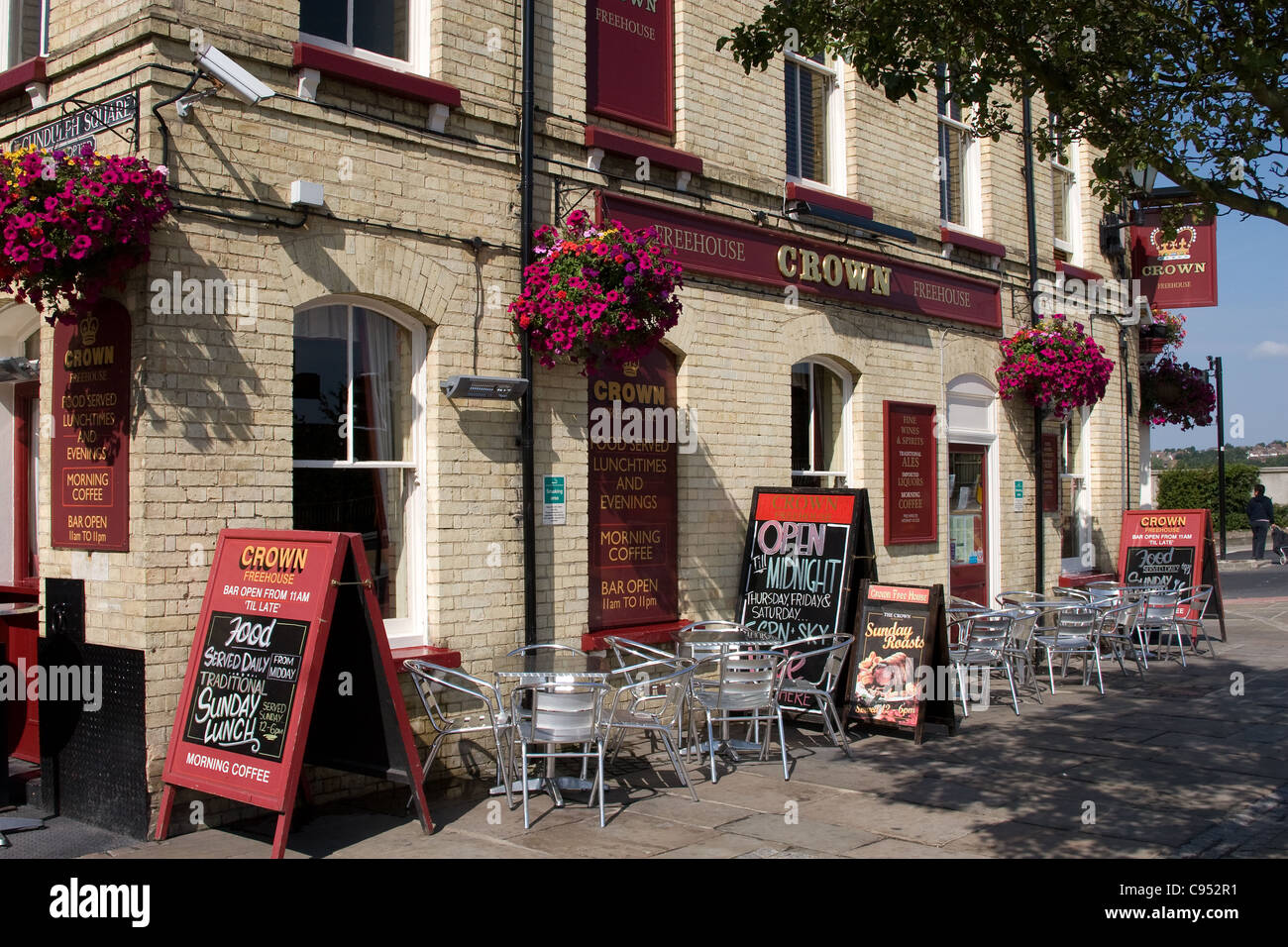 Rochester High Street retailers premises front Stock Photo Alamy