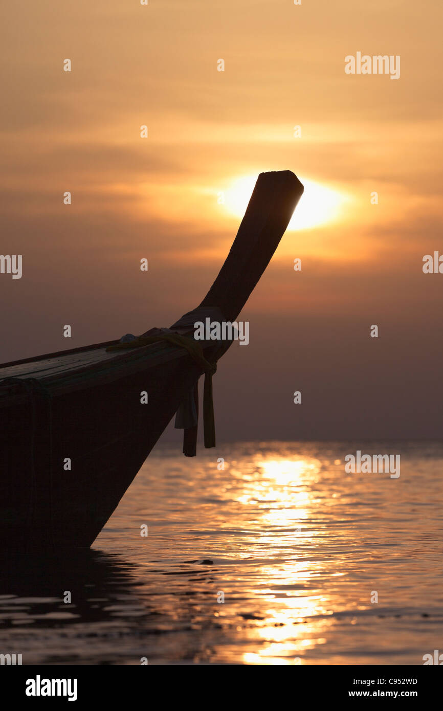 Longtail boat at sunset, Ko Lipe island,Thailand Stock Photo