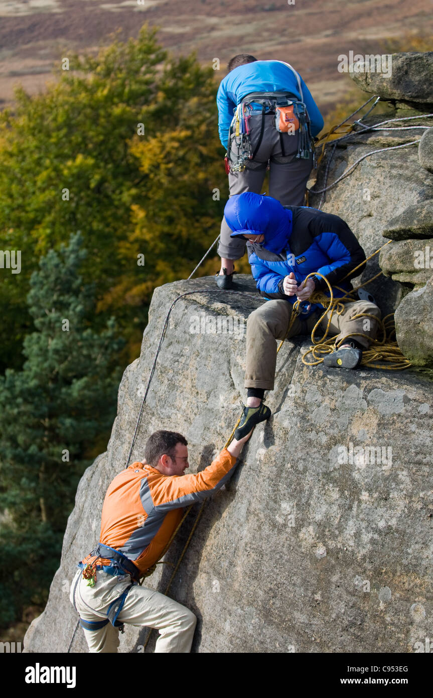 Stanage Top Rope Rock Climbers on the top of Stanage Edge in the Peak District National ...