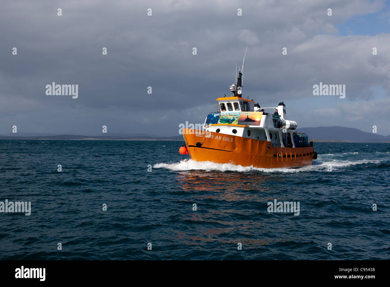 Dun an Oir II - ferry arriving at Cape Clear Island, Ireland's most ...