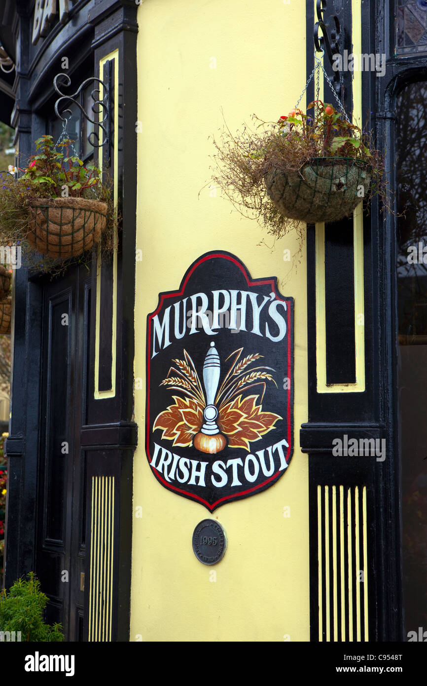 Murphy's Irish Stout sign outside a pub, in Cobh, Cork, Ireland. Murphy is a Cork-based brand of black beer, or stout. Stock Photo